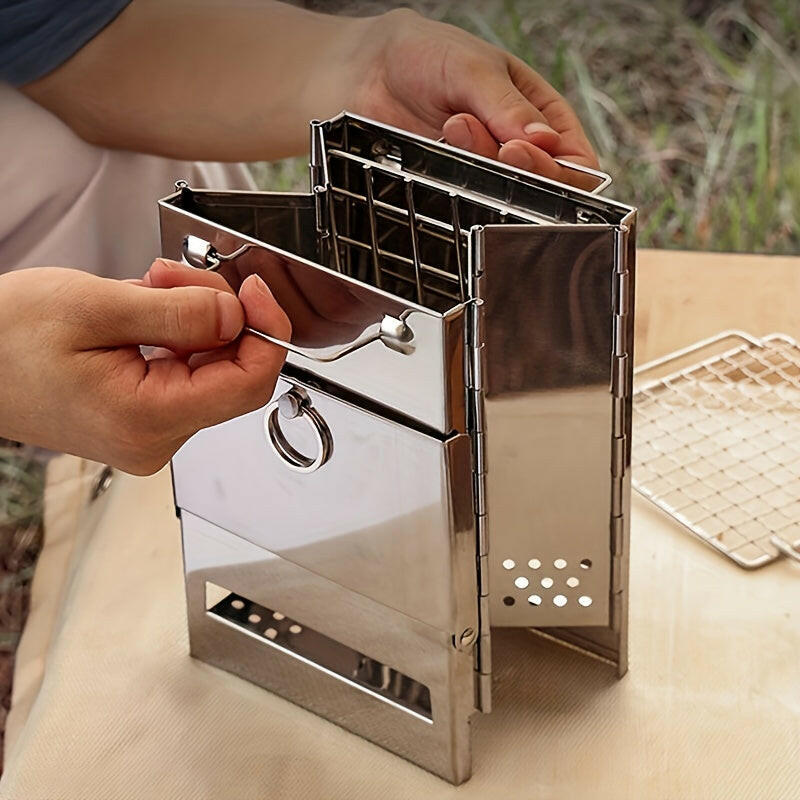 Experience the Great Outdoors with an Integrated Folding Mini Stainless Steel Charcoal Stove.
